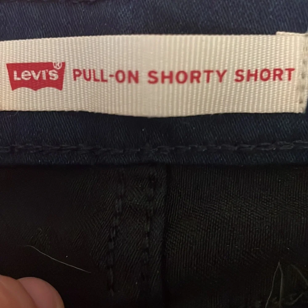 Levis Pull On Shorty Shorts, Size 5. Adjustable waist, back pockets.